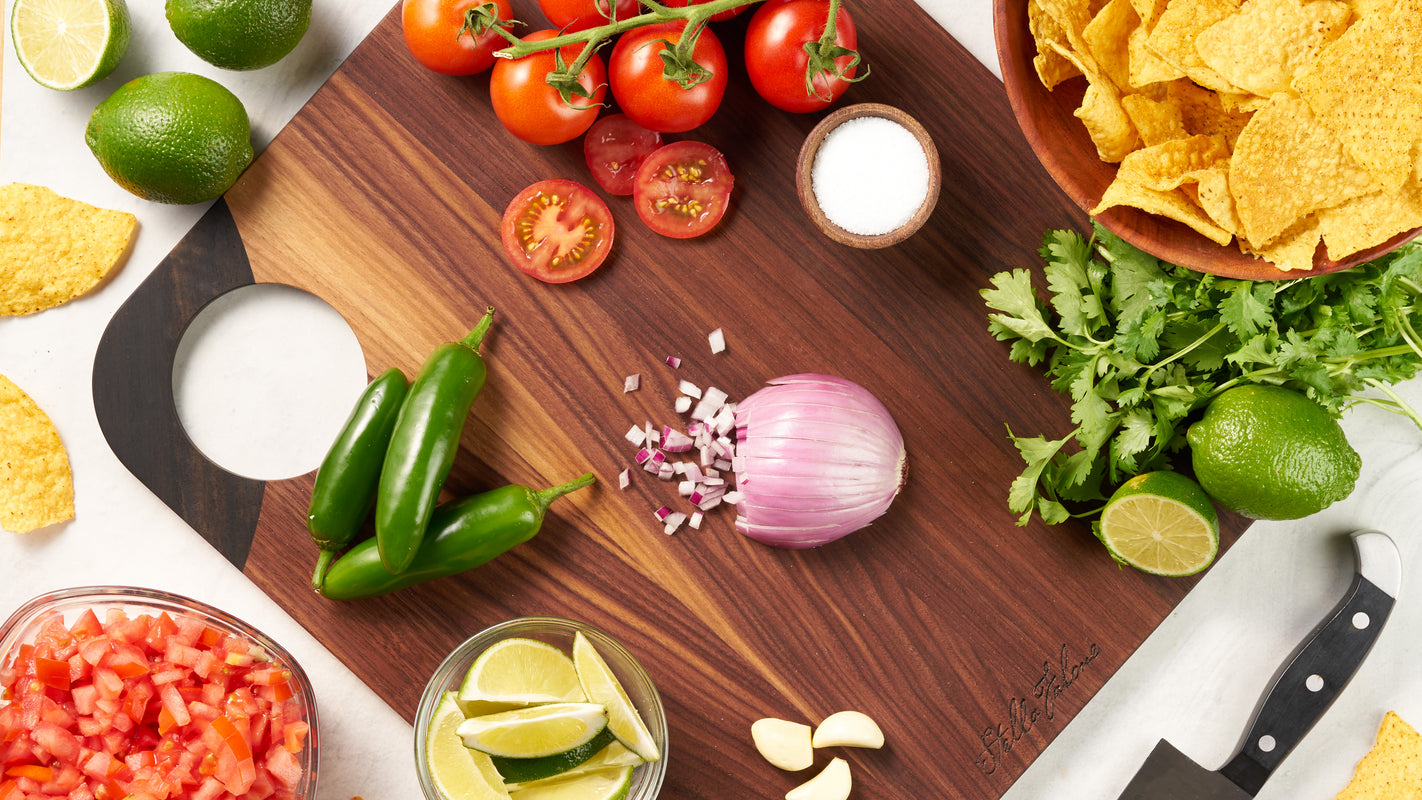 Cutting Board with Salsa Ingredients on it